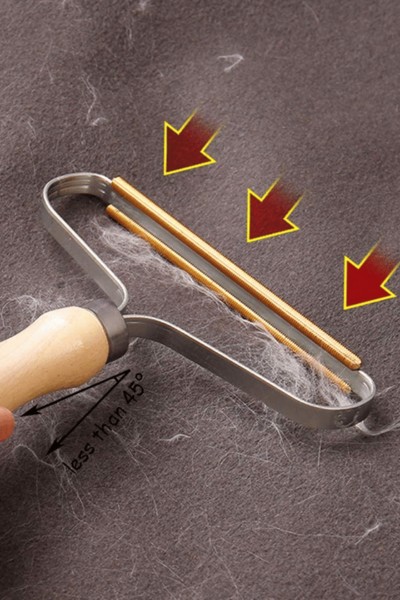 Usuwanie zmechaceń z ubrania za pomocą golarki