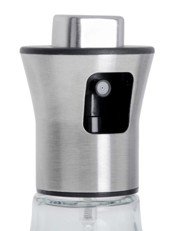 Dozownik spryskiwacza do oleju